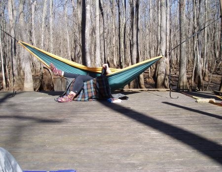 beaver lodge, person in hammock